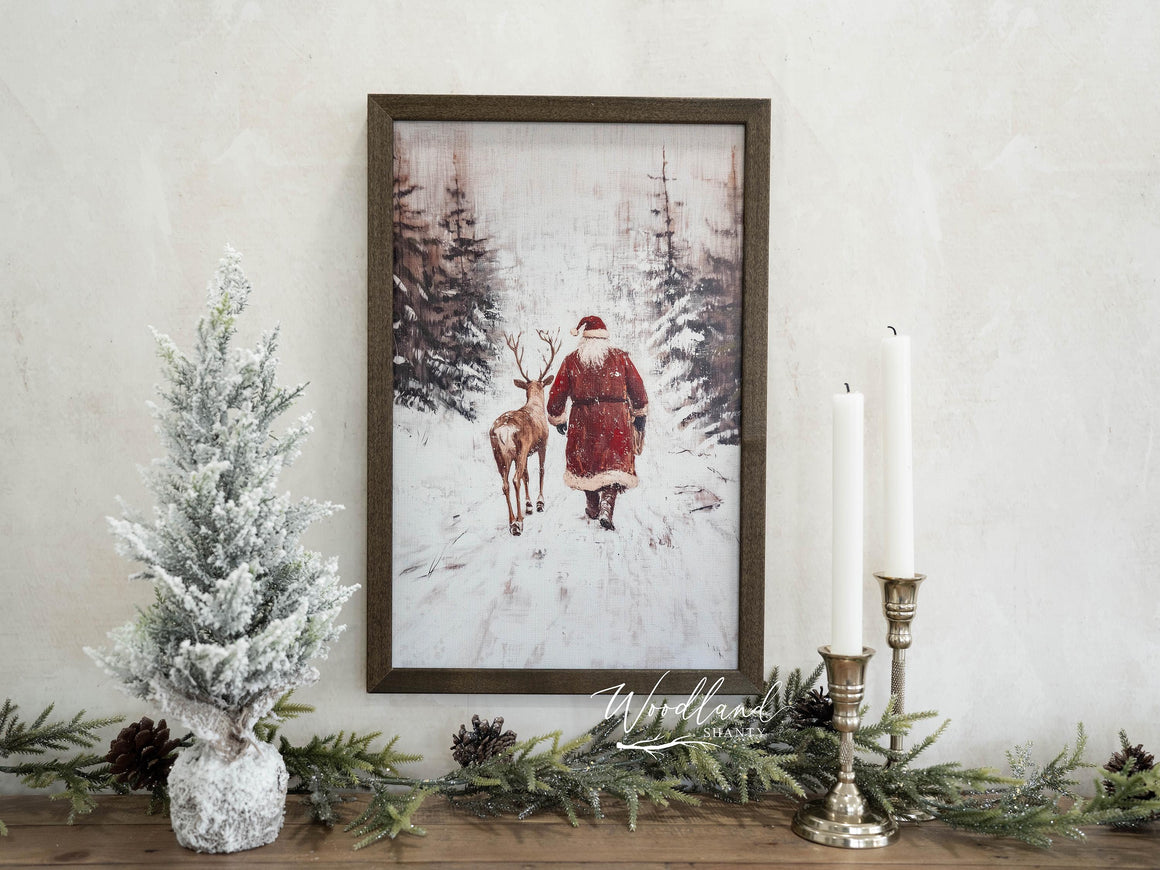 Rustic Santa and Reindeer Walking in Snow Framed Wall Art