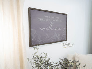 purple framed spring sign with tulips