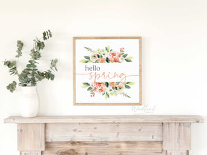 hello spring square framed sign with pink and white flowers and green leaves